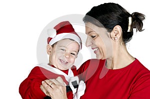 Small kid in Santa Claus clothes with his Ã¢â¬â¹Ã¢â¬â¹grandmother